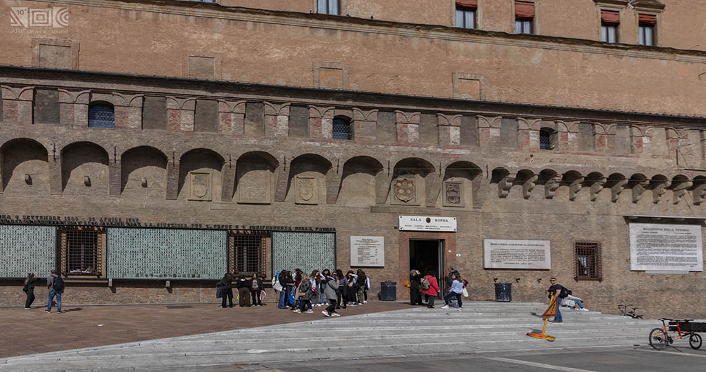Exterior of the Sala Borsa Library in Bologna, with the steps and partisan shrine visible.